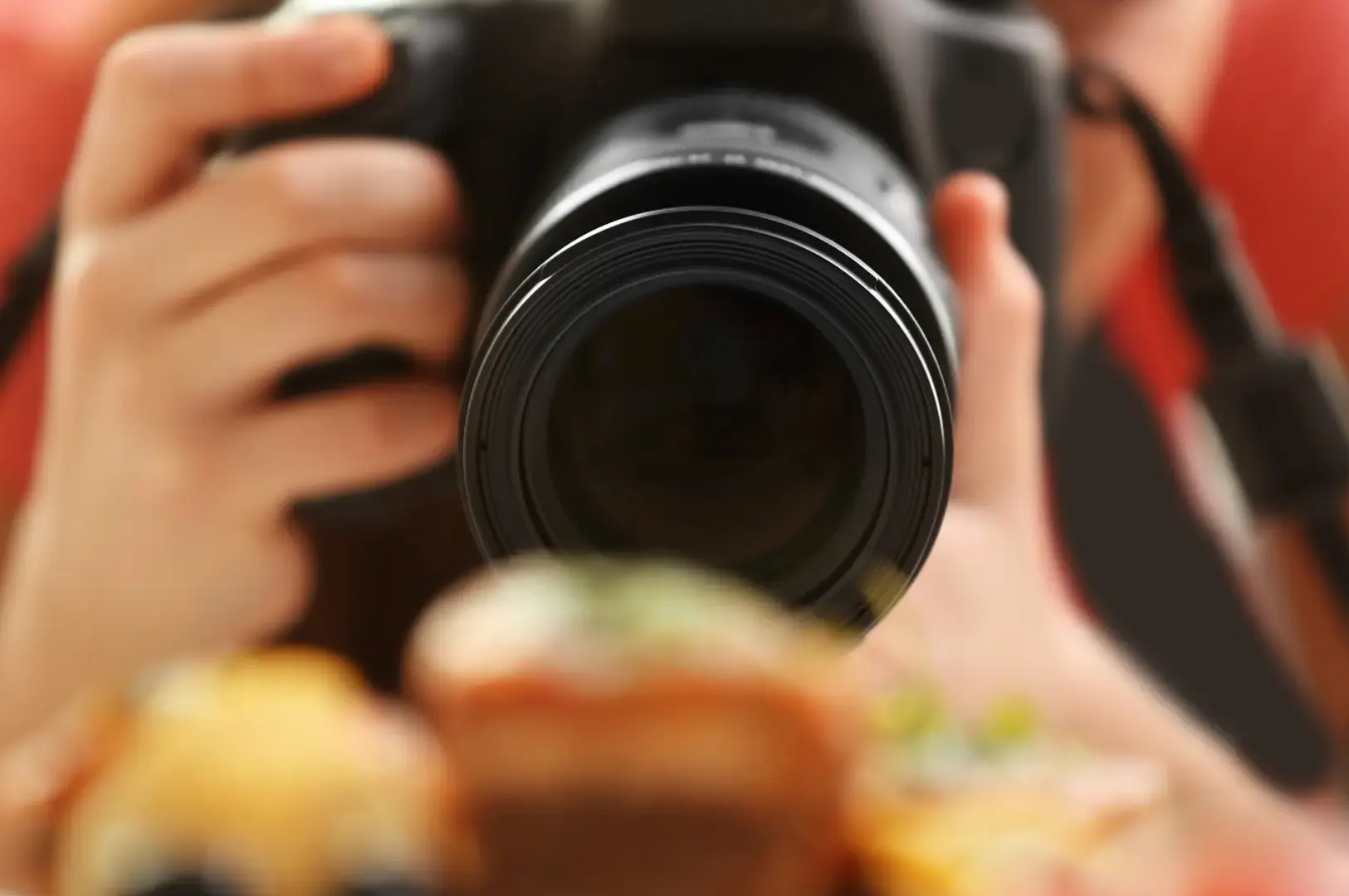 Camera lens focused on desserts