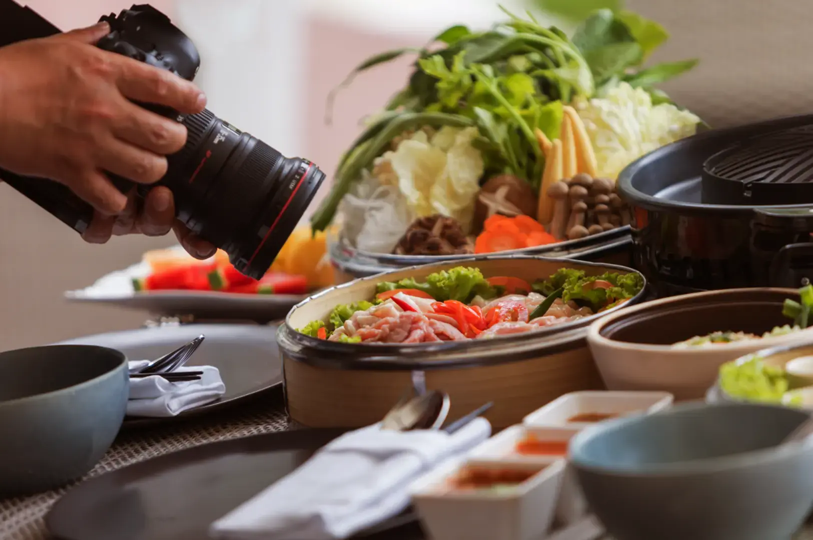Hand photographing plated dishes